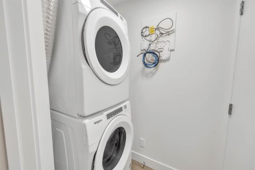 19625 45 Street Se, Calgary, AB - Indoor Photo Showing Laundry Room