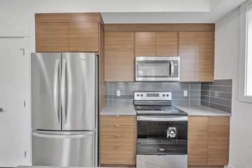 19625 45 Street Se, Calgary, AB - Indoor Photo Showing Kitchen With Stainless Steel Kitchen