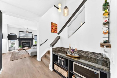 132 Evanscove Manor Nw, Calgary, AB - Indoor With Fireplace
