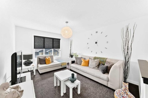 132 Evanscove Manor Nw, Calgary, AB - Indoor Photo Showing Living Room