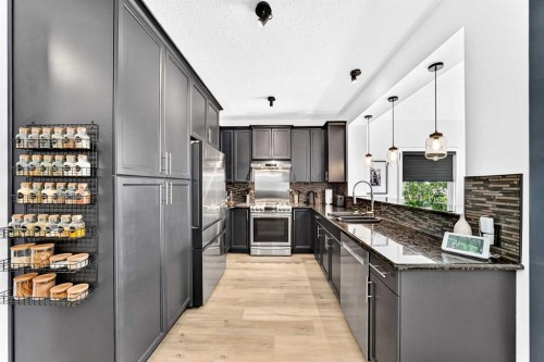 132 Evanscove Manor Nw, Calgary, AB - Indoor Photo Showing Kitchen With Stainless Steel Kitchen With Upgraded Kitchen