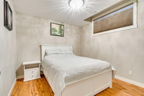 215 Patton Court Sw, Calgary, AB - Indoor Photo Showing Bedroom