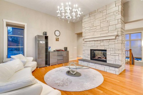 215 Patton Court Sw, Calgary, AB - Indoor Photo Showing Living Room With Fireplace