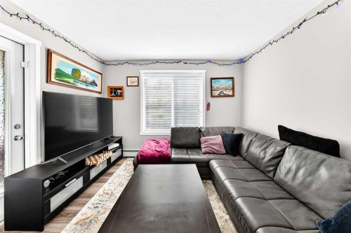 2314-4641 128 Avenue Ne, Calgary, AB - Indoor Photo Showing Living Room