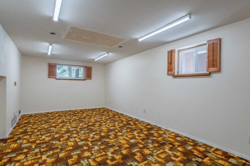 106 Elma Street West, Okotoks, AB - Indoor Photo Showing Other Room