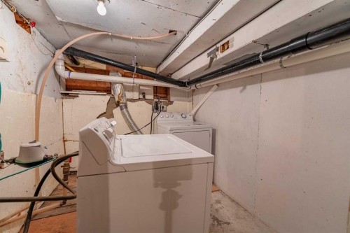 106 Elma Street West, Okotoks, AB - Indoor Photo Showing Laundry Room