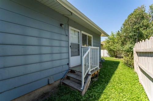 106 Elma Street West, Okotoks, AB - Outdoor With Exterior