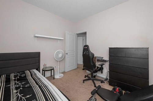 62 Redstone Mews Ne, Calgary, AB - Indoor Photo Showing Bedroom