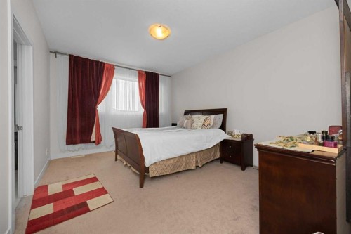 62 Redstone Mews Ne, Calgary, AB - Indoor Photo Showing Bedroom