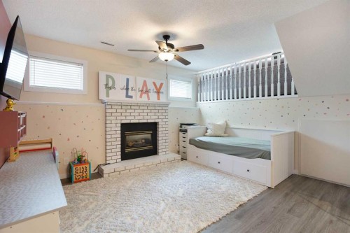 5 Shawglen Court Sw, Calgary, AB - Indoor With Fireplace