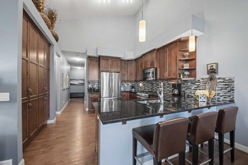 59 Evanswood Circle Nw, Calgary, AB - Indoor Photo Showing Kitchen With Stainless Steel Kitchen With Upgraded Kitchen