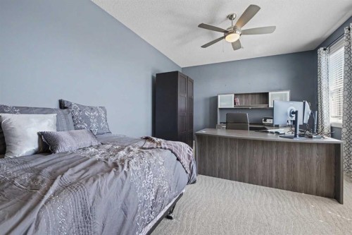 59 Evanswood Circle Nw, Calgary, AB - Indoor Photo Showing Bedroom