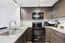 3307-402 Kincora Glen Road Nw, Calgary, AB  - Indoor Photo Showing Kitchen With Double Sink 