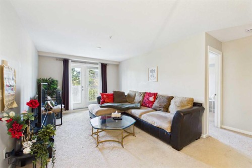 3307-402 Kincora Glen Road Nw, Calgary, AB - Indoor Photo Showing Living Room