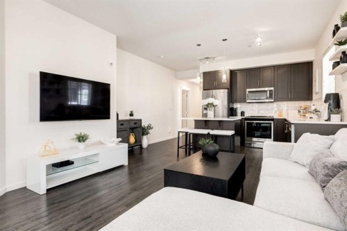 7310-151 Legacy Main Street Se, Calgary, AB - Indoor Photo Showing Living Room