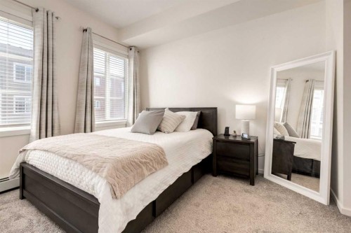 7310-151 Legacy Main Street Se, Calgary, AB - Indoor Photo Showing Bedroom