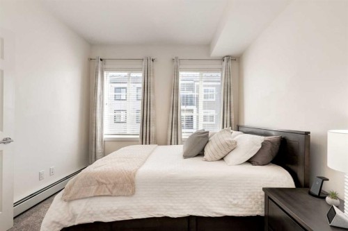 7310-151 Legacy Main Street Se, Calgary, AB - Indoor Photo Showing Bedroom