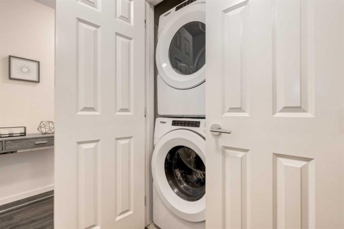 7310-151 Legacy Main Street Se, Calgary, AB - Indoor Photo Showing Laundry Room