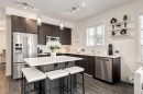 7310-151 Legacy Main Street Se, Calgary, AB  - Indoor Photo Showing Kitchen With Stainless Steel Kitchen With Upgraded Kitchen 