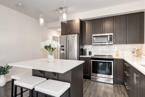 7310-151 Legacy Main Street Se, Calgary, AB - Indoor Photo Showing Kitchen With Stainless Steel Kitchen With Upgraded Kitchen