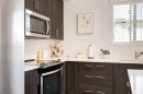 7310-151 Legacy Main Street Se, Calgary, AB  - Indoor Photo Showing Kitchen With Upgraded Kitchen 