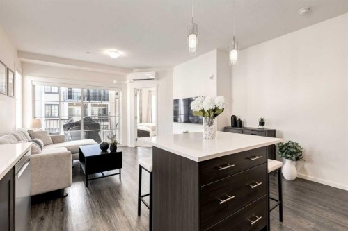 7310-151 Legacy Main Street Se, Calgary, AB - Indoor Photo Showing Living Room
