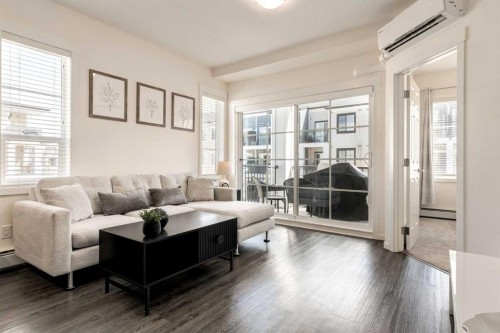 7310-151 Legacy Main Street Se, Calgary, AB - Indoor Photo Showing Living Room