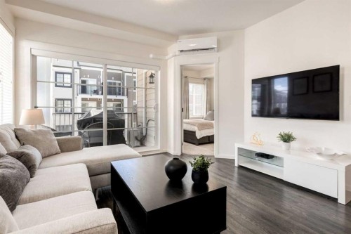 7310-151 Legacy Main Street Se, Calgary, AB - Indoor Photo Showing Living Room