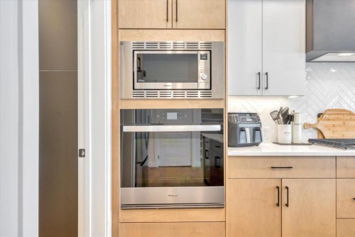 77 Versant Point Sw, Calgary, AB - Indoor Photo Showing Kitchen