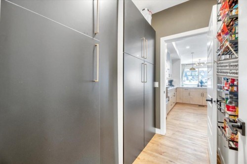 77 Versant Point Sw, Calgary, AB - Indoor Photo Showing Living Room