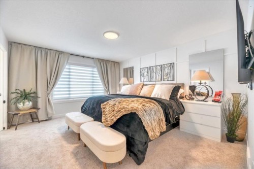 77 Versant Point Sw, Calgary, AB - Indoor Photo Showing Living Room