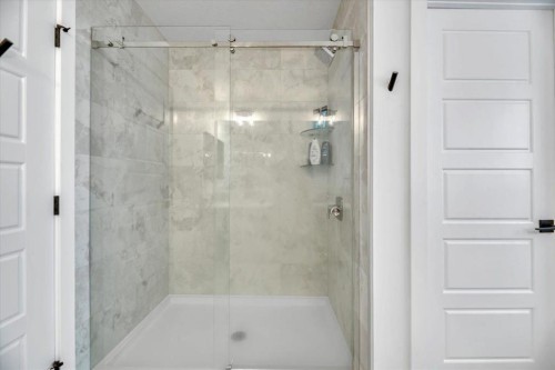 77 Versant Point Sw, Calgary, AB - Indoor Photo Showing Bedroom
