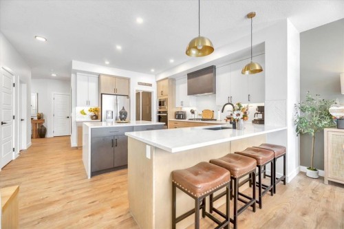77 Versant Point Sw, Calgary, AB - Indoor Photo Showing Kitchen With Upgraded Kitchen
