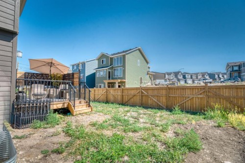 77 Versant Point Sw, Calgary, AB - Indoor Photo Showing Laundry Room