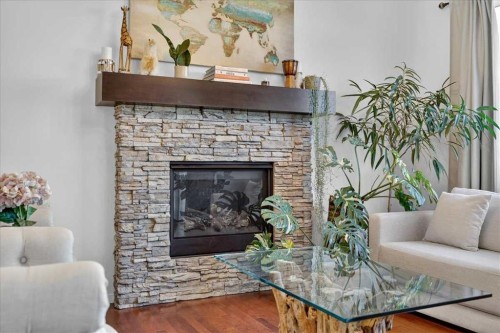 42 Nolancrest Rise Nw, Calgary, AB - Indoor Photo Showing Living Room With Fireplace