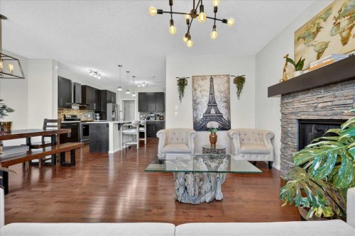 42 Nolancrest Rise Nw, Calgary, AB - Indoor Photo Showing Living Room With Fireplace
