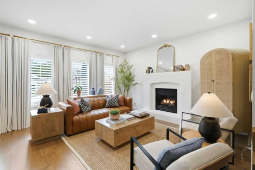 1076 Prestwick Circle Se, Calgary, AB - Indoor Photo Showing Living Room With Fireplace
