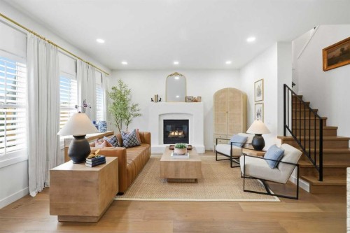 1076 Prestwick Circle Se, Calgary, AB - Indoor Photo Showing Living Room With Fireplace