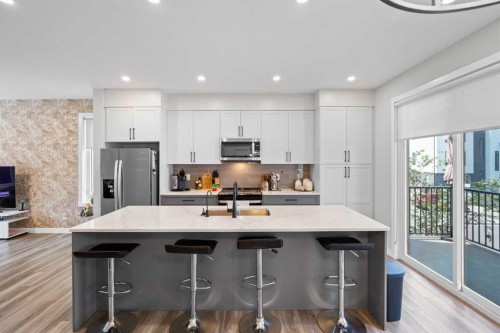 32 Evanscrest Court Nw, Calgary, AB - Indoor Photo Showing Kitchen With Stainless Steel Kitchen With Upgraded Kitchen