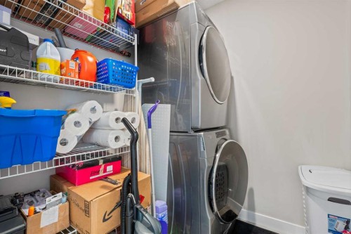 32 Evanscrest Court Nw, Calgary, AB - Indoor Photo Showing Laundry Room