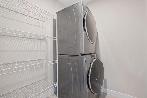 32 Evanscrest Court Nw, Calgary, AB - Indoor Photo Showing Laundry Room