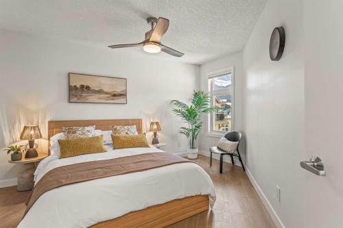 411-160 Kananaskis Way, Canmore, AB - Indoor Photo Showing Bedroom