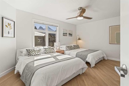 411-160 Kananaskis Way, Canmore, AB - Indoor Photo Showing Bedroom