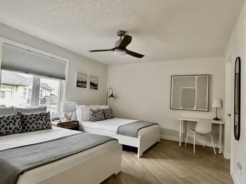 411-160 Kananaskis Way, Canmore, AB - Indoor Photo Showing Bedroom