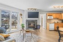 411-160 Kananaskis Way, Canmore, AB  - Indoor Photo Showing Living Room With Fireplace 