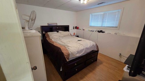 155 Applefield Close Se, Calgary, AB - Indoor Photo Showing Bedroom
