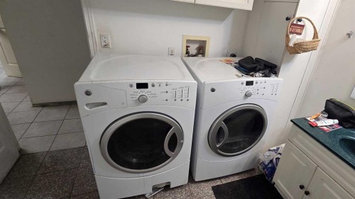 155 Applefield Close Se, Calgary, AB - Indoor Photo Showing Laundry Room
