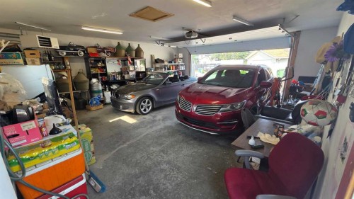 155 Applefield Close Se, Calgary, AB - Indoor Photo Showing Garage
