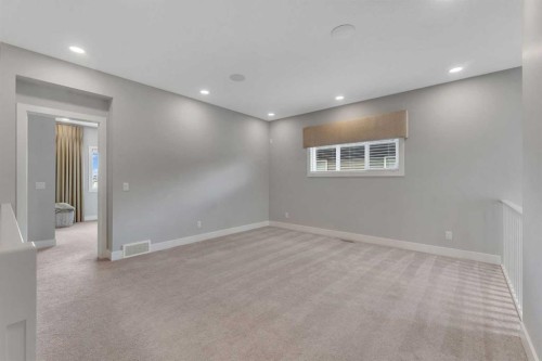 81 Carringvue Manor Nw, Calgary, AB - Indoor Photo Showing Other Room