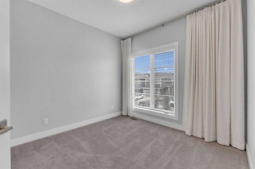81 Carringvue Manor Nw, Calgary, AB - Indoor Photo Showing Other Room